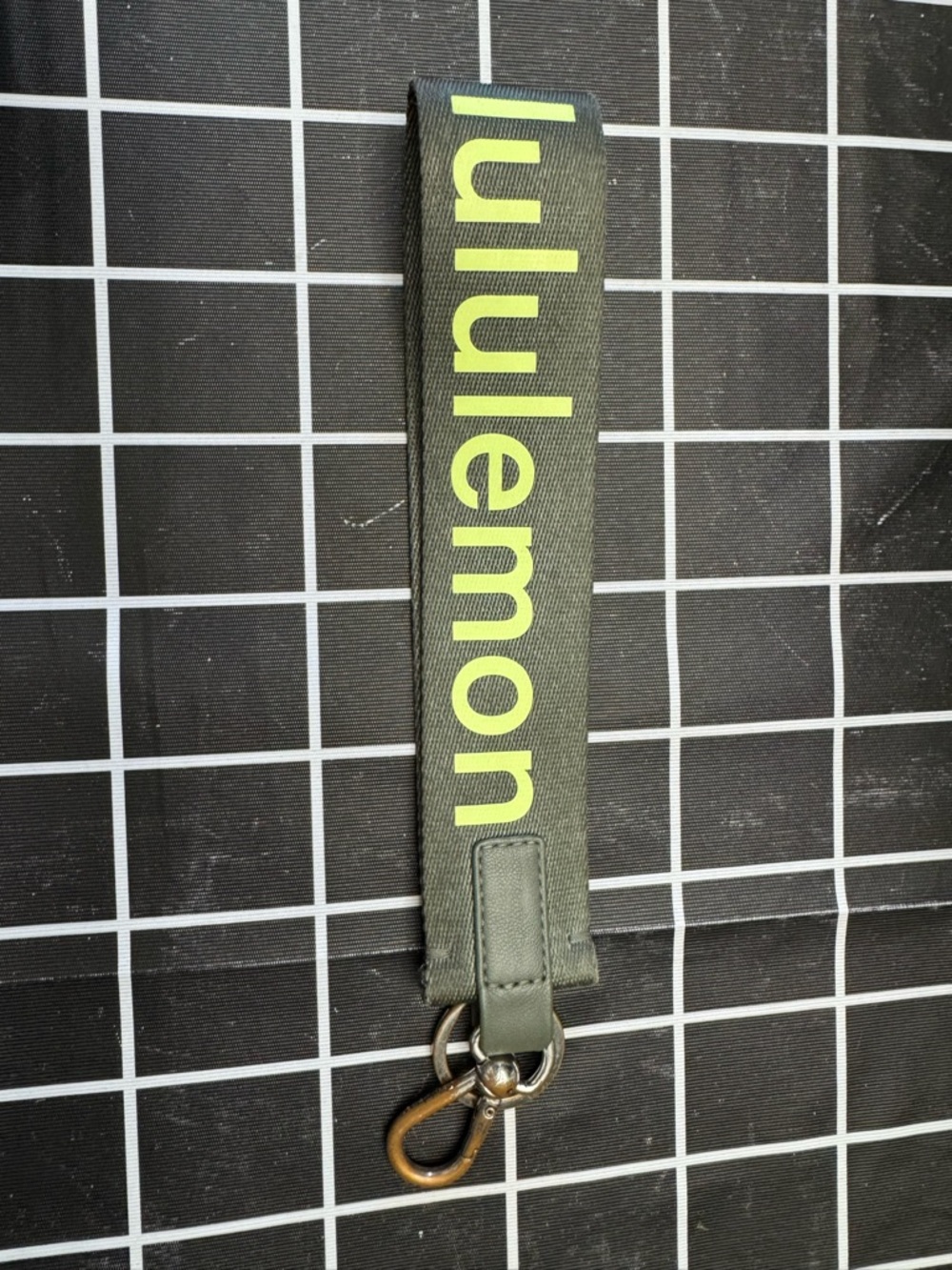 Lululemon Olive Green Never Lost Keychain Strap with Lime Yellow Logo